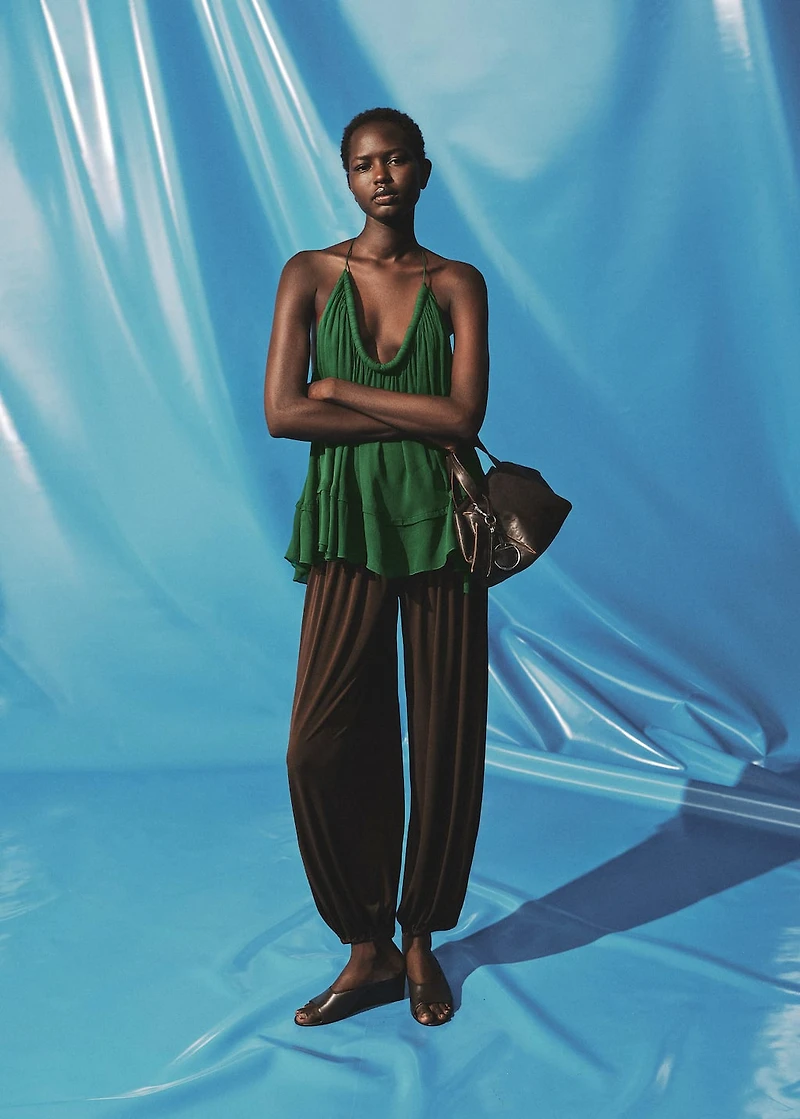 Top with pleated back neckline