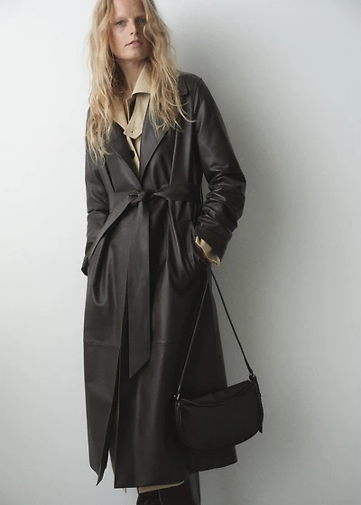 Oval shoulder bag with flap