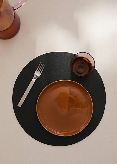 Round faux leather placemat