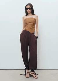 Asymmetrical strapless top