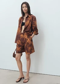 Cotton bermuda shorts with palm-tree print