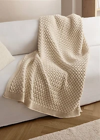 Knitted interwoven blanket