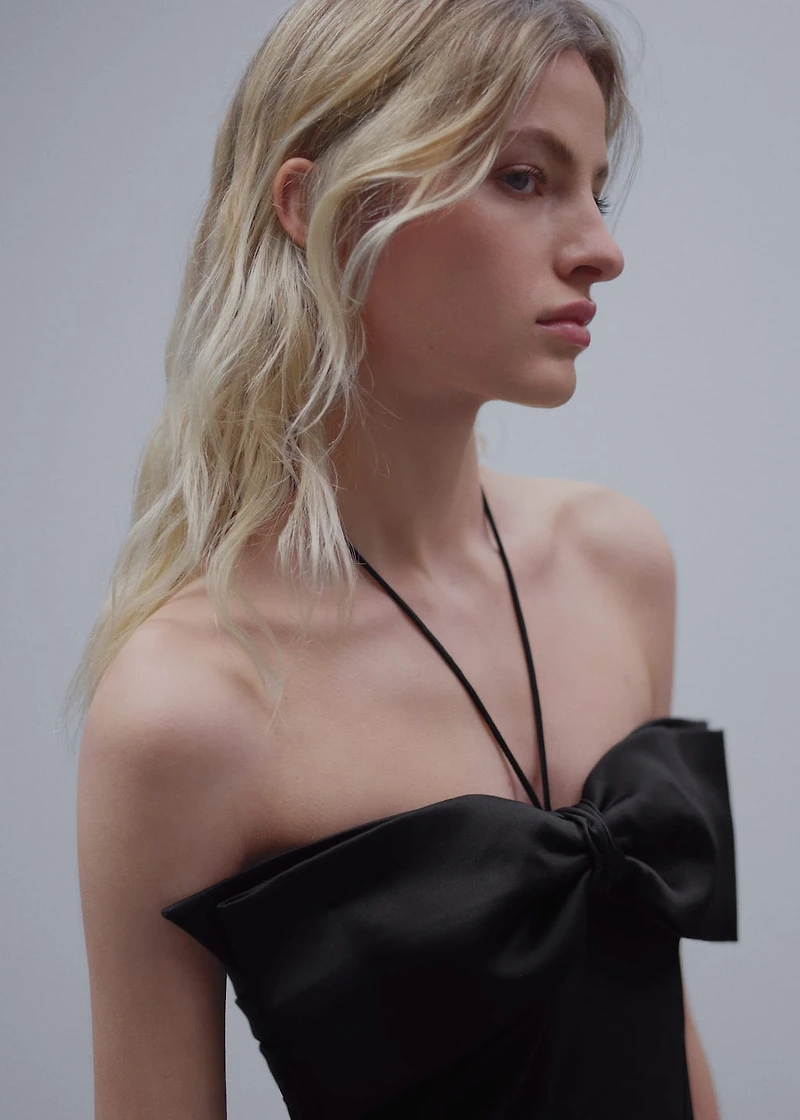 Crossed dress with bow neckline
