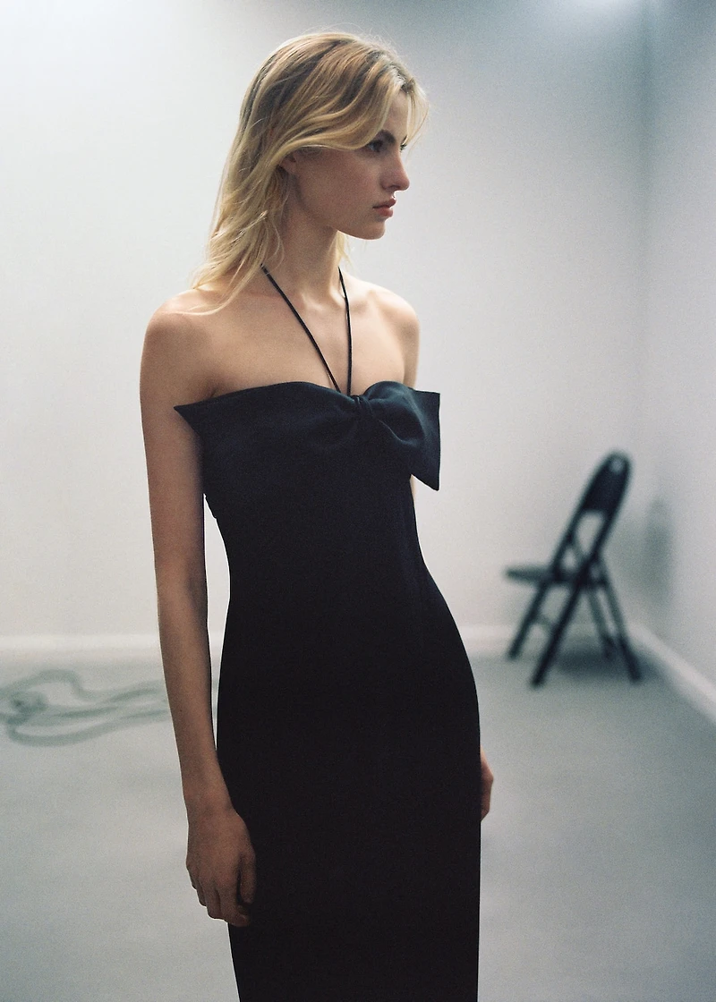 Crossed dress with bow neckline