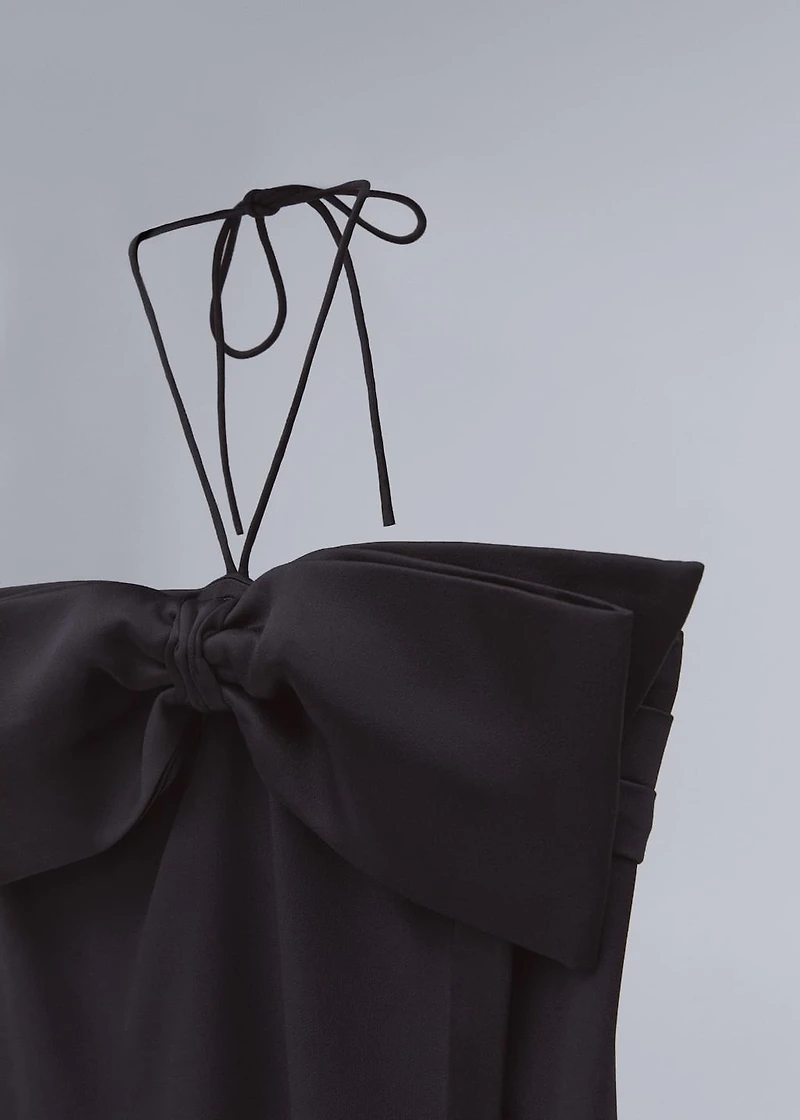 Crossed dress with bow neckline