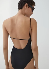 Swimsuit with asymmetrical opening