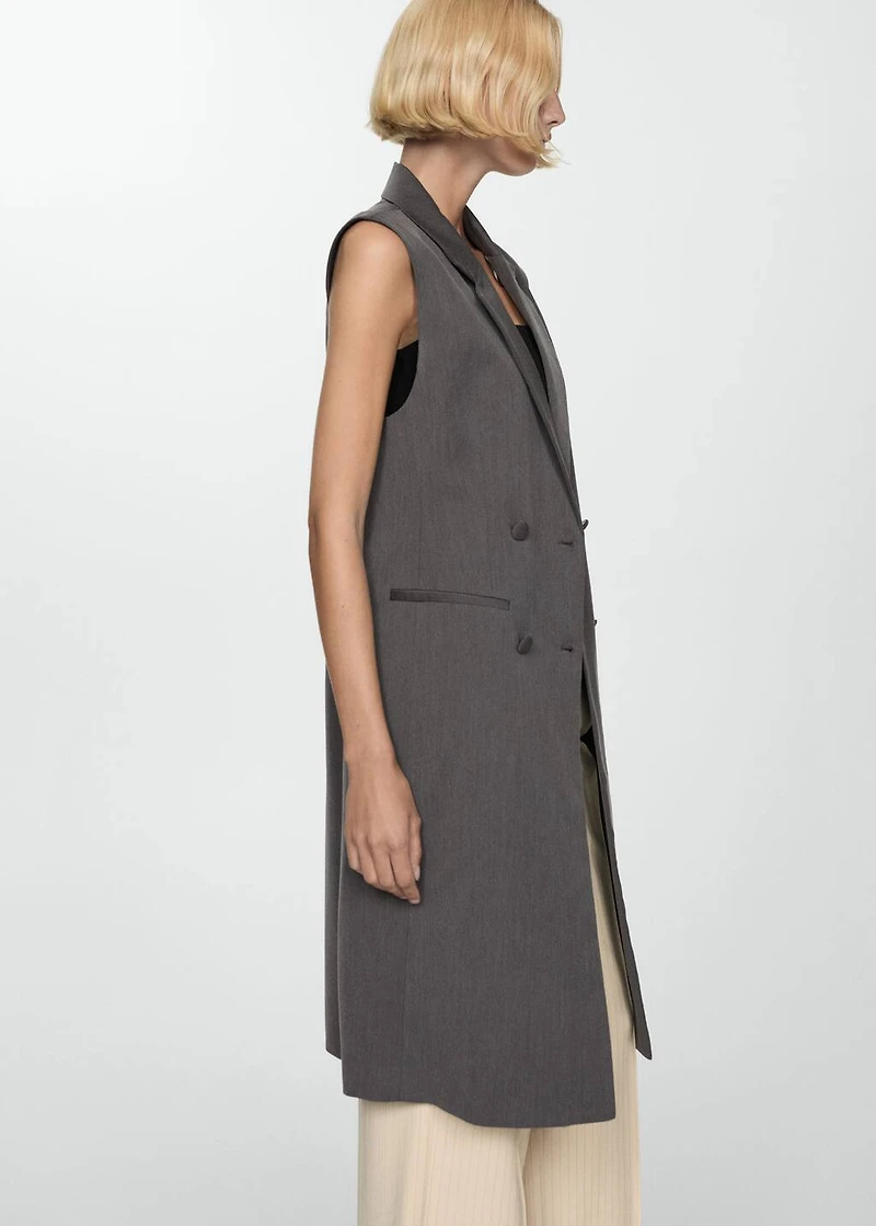 Long buttoned vest