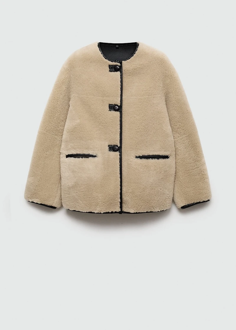 Fur-effect coat with appliqués
