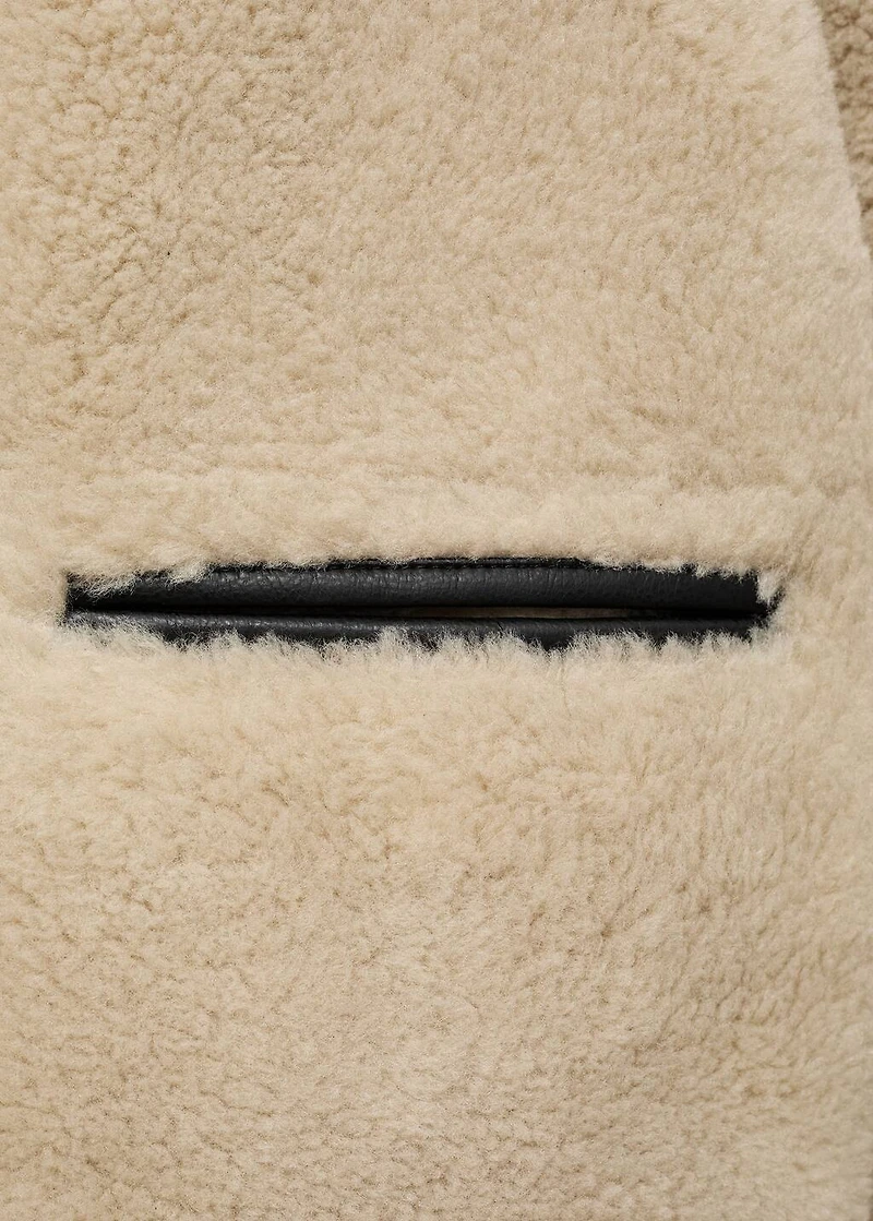 Fur-effect coat with appliqués