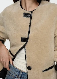 Fur-effect coat with appliqués
