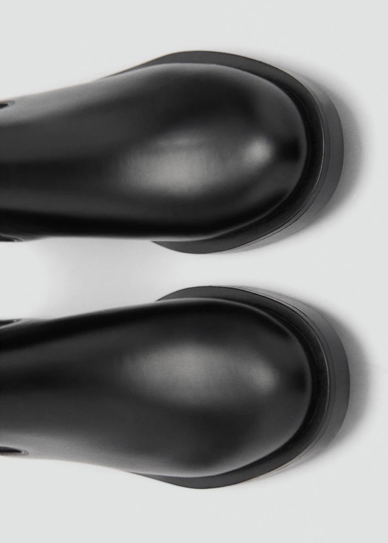 Ankle boots with elastic panel and buckle