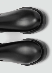 Ankle boots with elastic panel and buckle