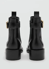Ankle boots with elastic panel and buckle