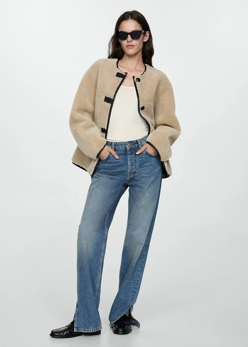 Fur-effect coat with appliqués