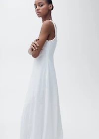 Embroidered dress with puffed hem