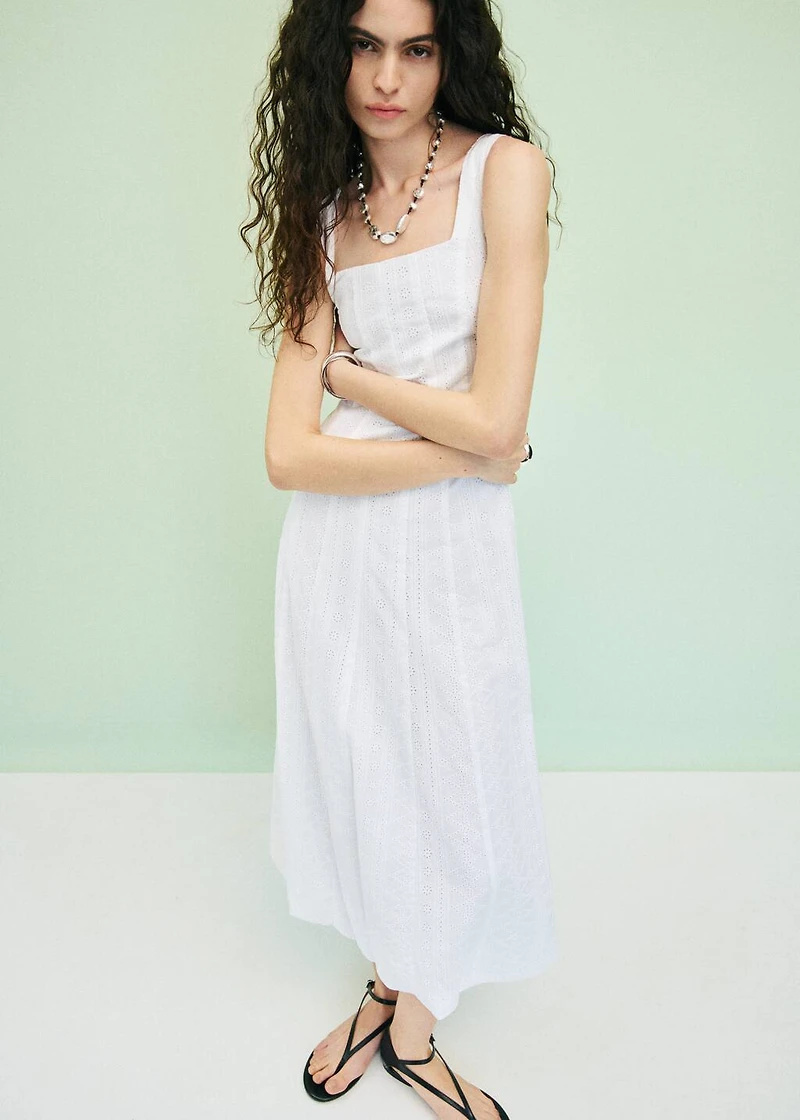 Embroidered dress with puffed hem