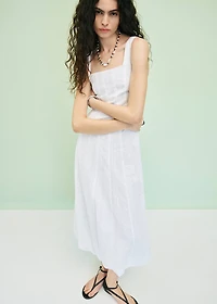 Embroidered dress with puffed hem