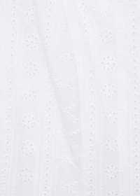 Embroidered dress with puffed hem