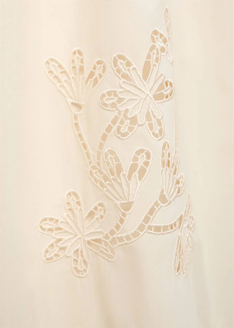 Combined dress with embroidered details
