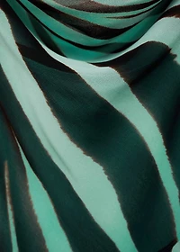 Zebra-print dress with ruffles