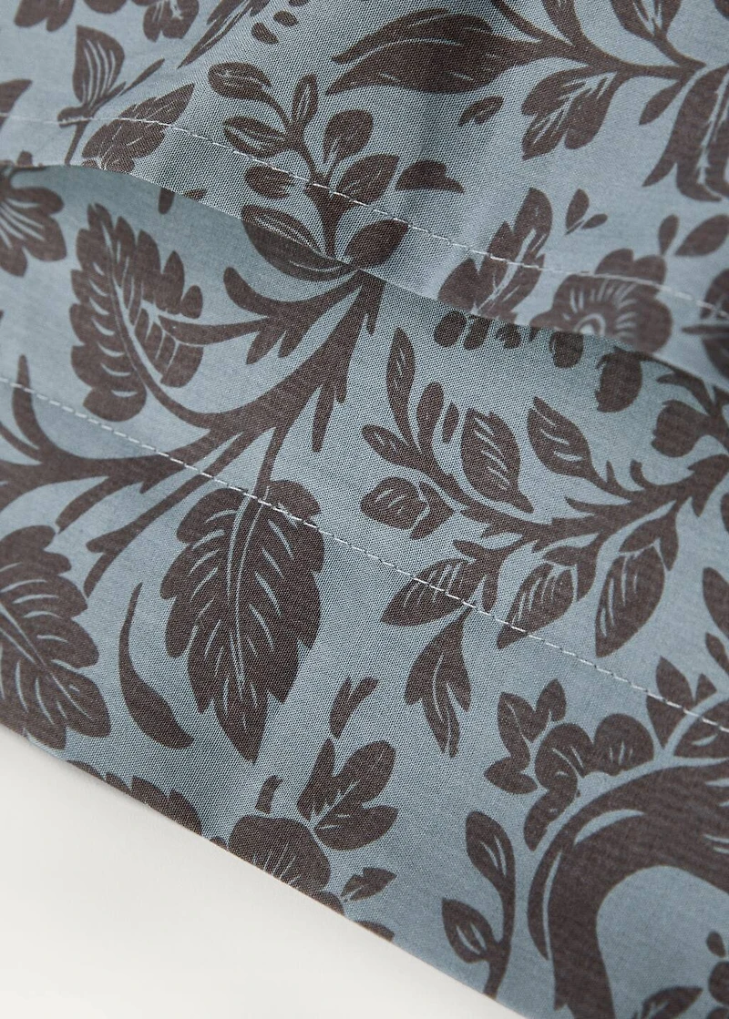 Two cotton percale two-tone floral-print pillowcases 60x60 cm