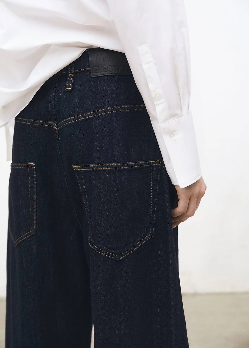 Low-rise wide leg rinse-wash jeans