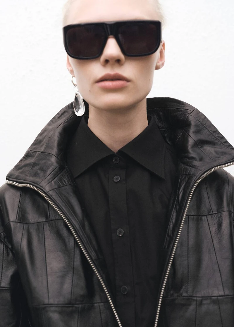Fitted shirt with cuffless sleeves