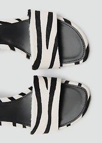 Zebra-print fur sandals