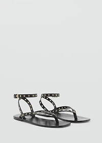 Leather sandals with eyelet straps