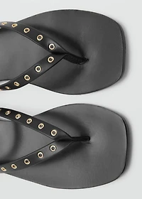 Leather sandals with eyelet straps