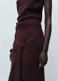 Knitted skirt with knot detail