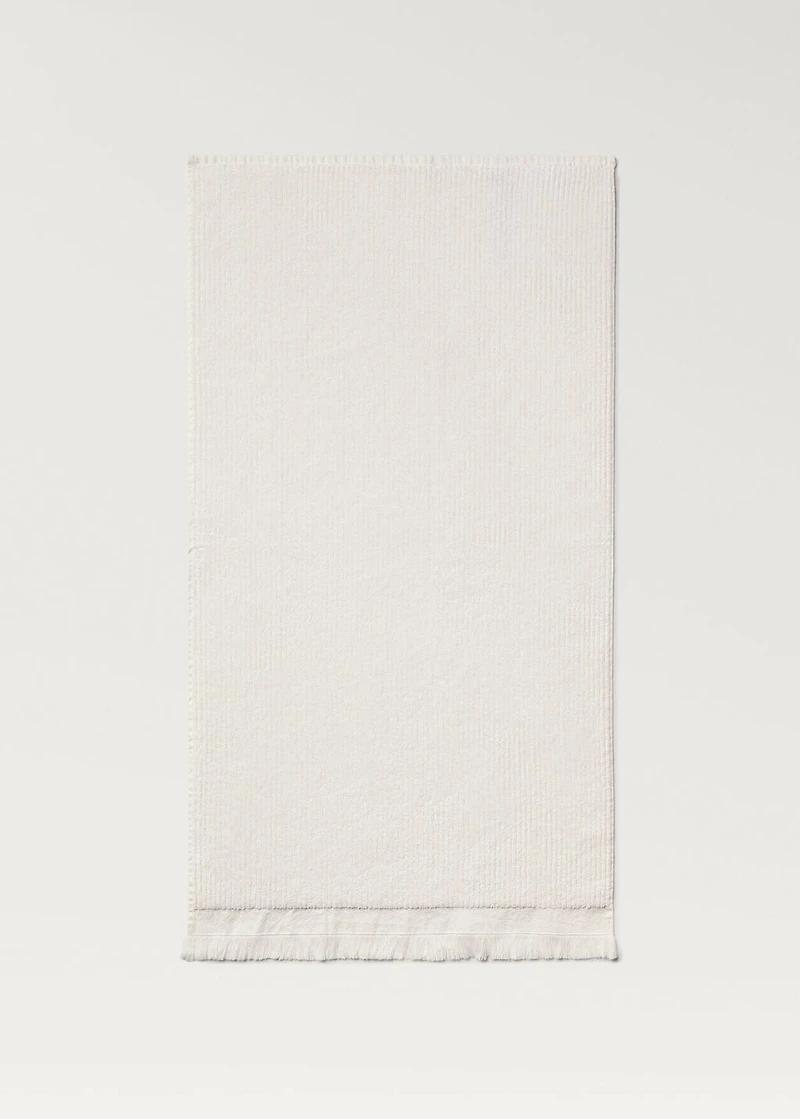 Stripe-embossed hand towel with fringes