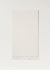 Stripe-embossed hand towel with fringes