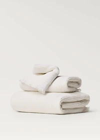 Stripe-embossed washbasin towel with fringes