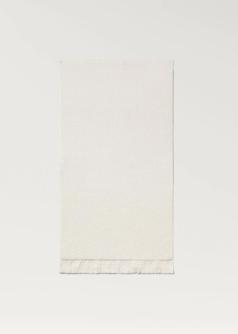 Stripe-embossed washbasin towel with fringes