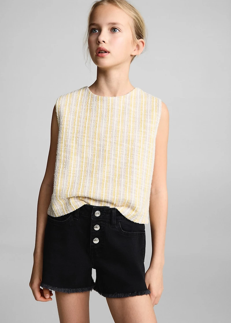 Denim shorts with frayed hem