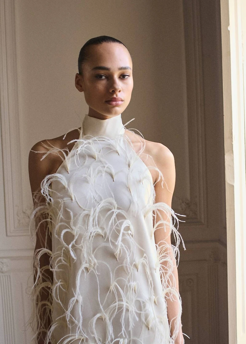 Halter dress with feather decoration
