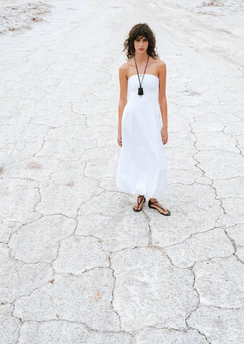 Strapless dress with puffed hem