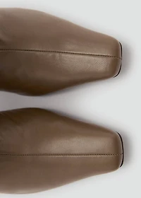 Leather ankle boot with fringe heel
