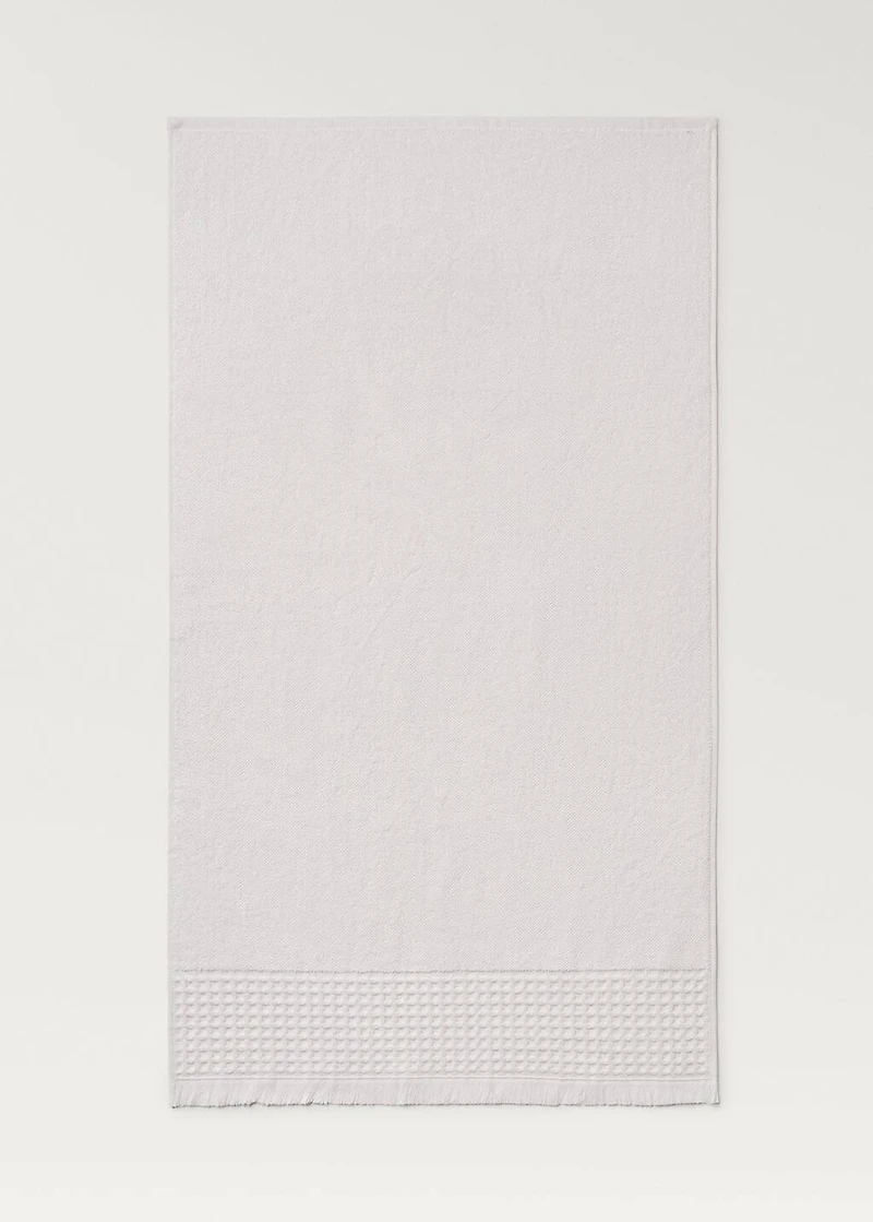 Bath towel with waffle trim and fringe
