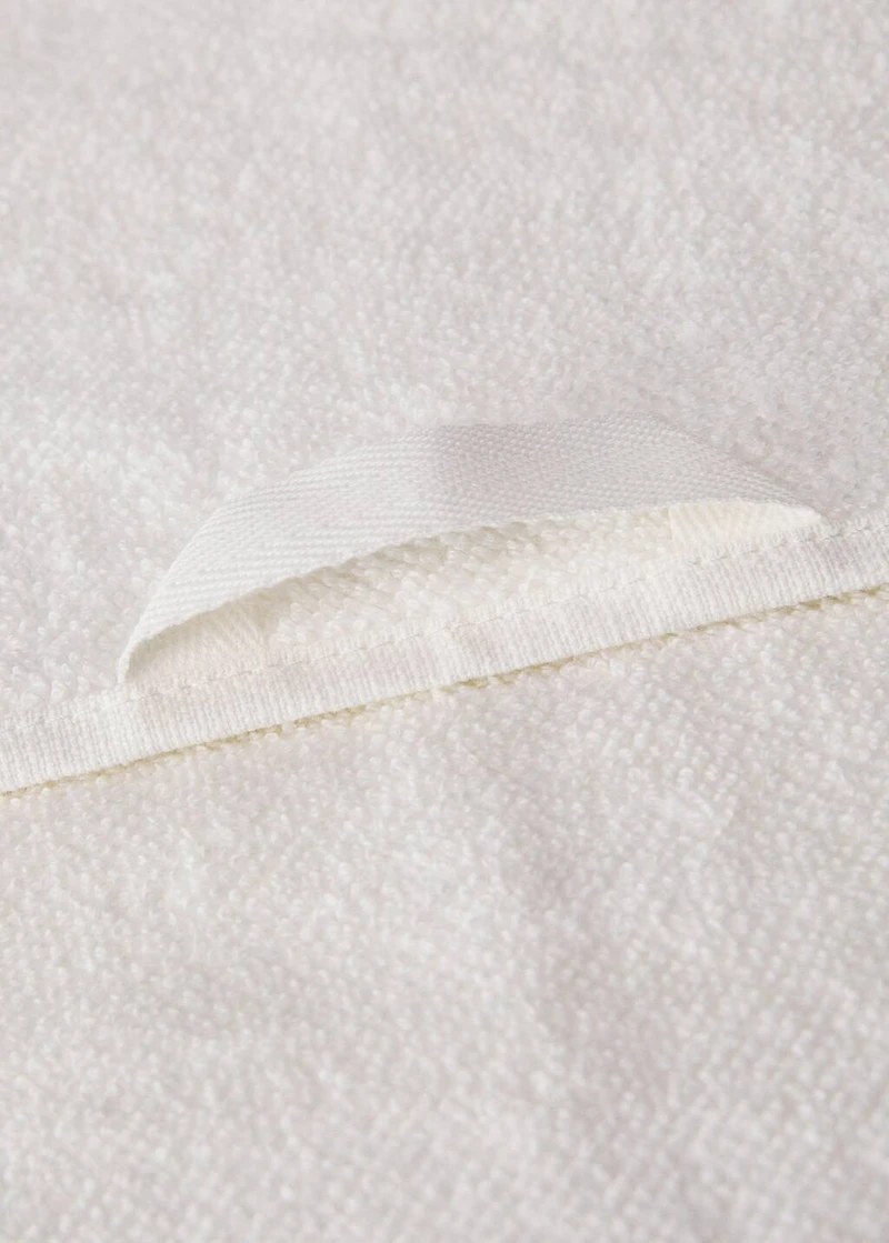 Hand towel with waffle trim and fringe