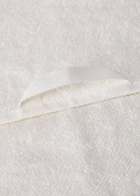 Hand towel with waffle trim and fringe