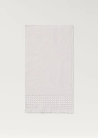 Hand towel with waffle trim and fringe