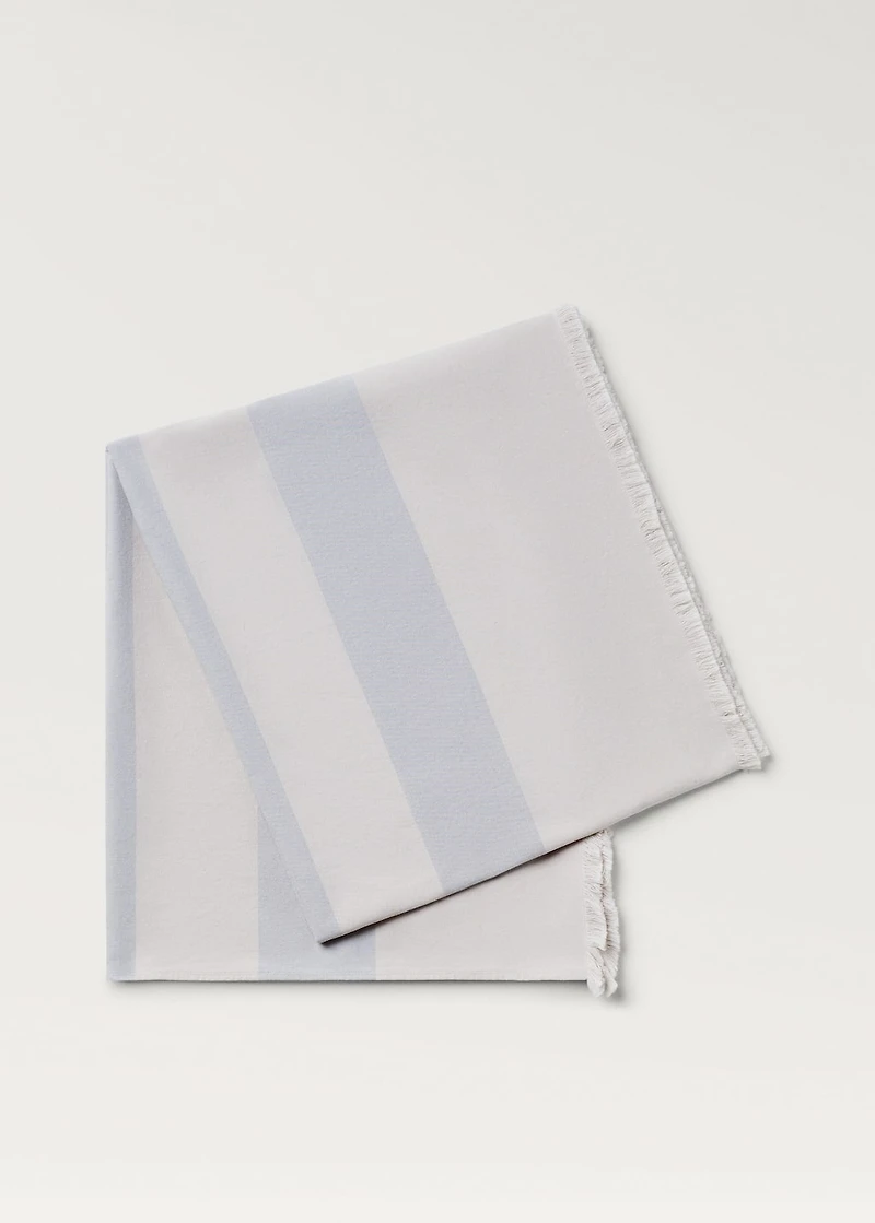Cotton beach towel with stripes and fringed trim