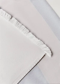 Cotton beach towel with stripes and fringed trim