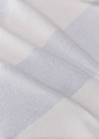 Cotton beach towel with stripes and fringed trim