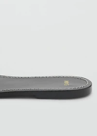 Leather sandals with intertwined strap