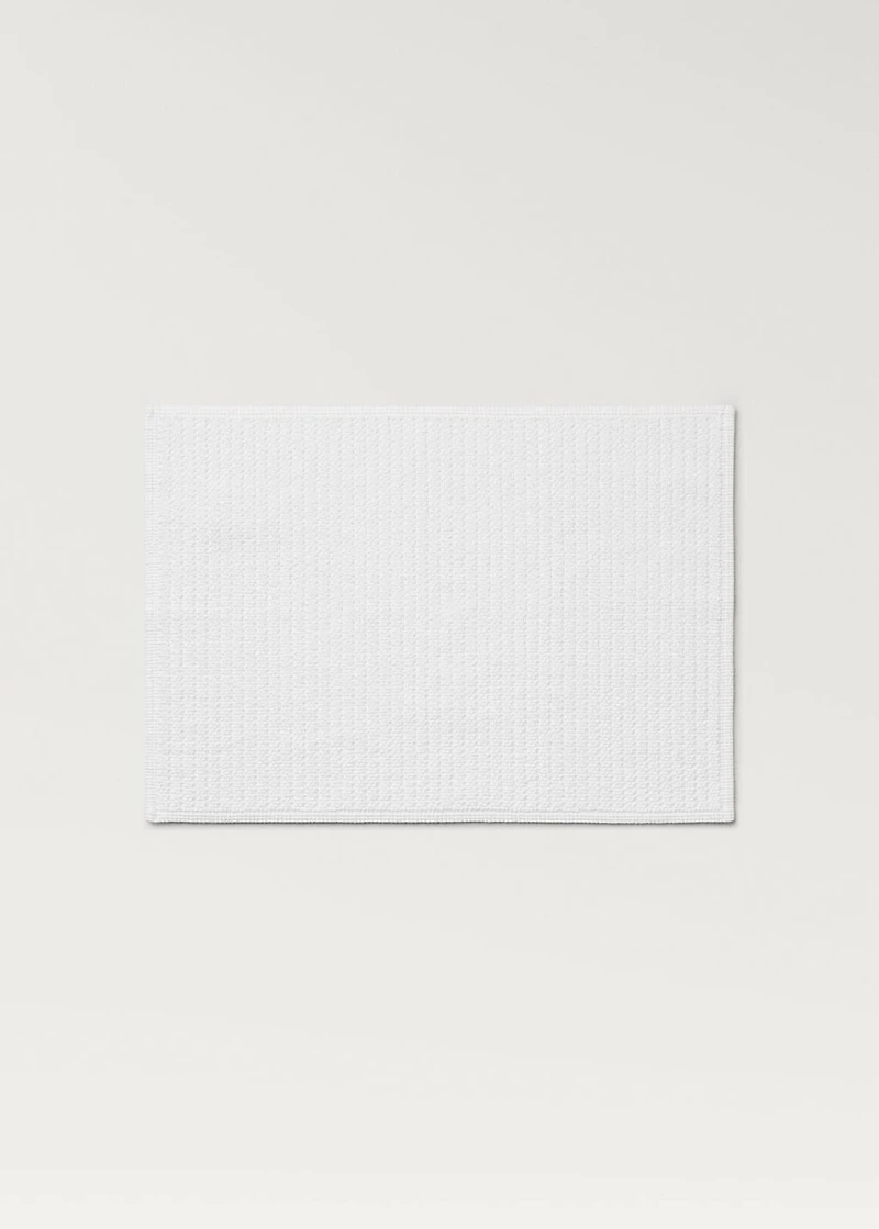 Reversible bath mat