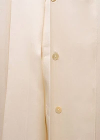 Cape-style silk dress with bow neck