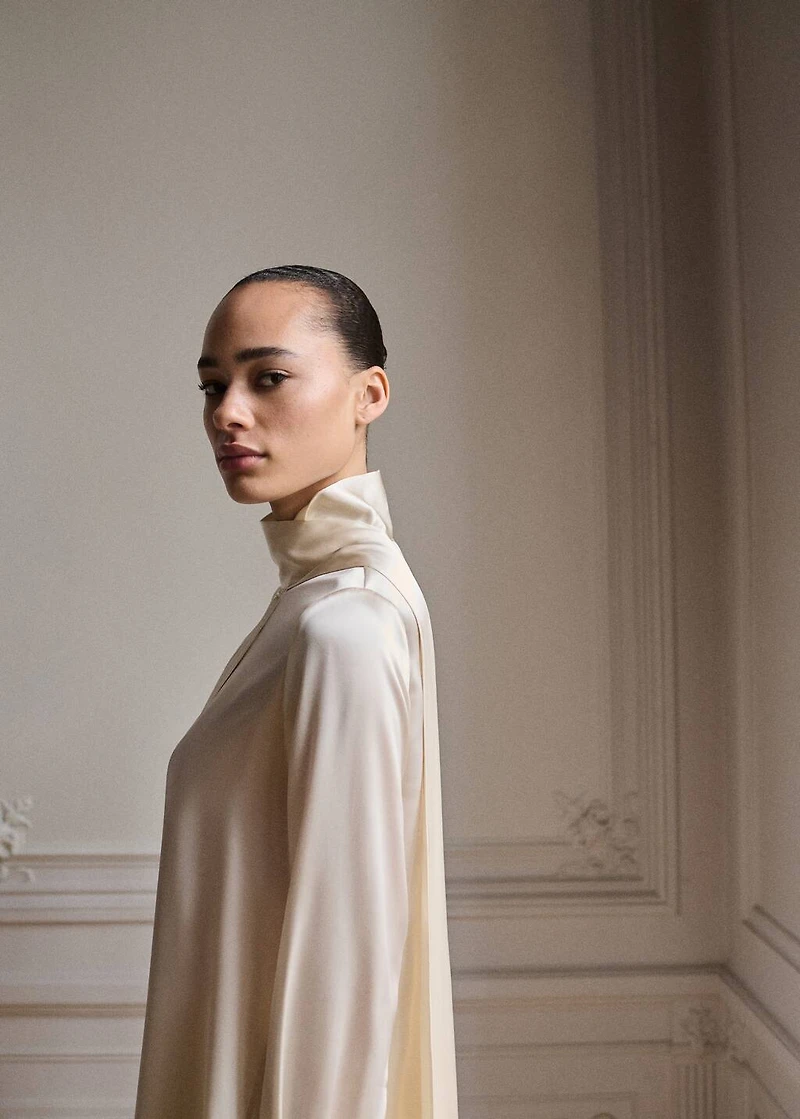 Cape-style silk dress with bow neck